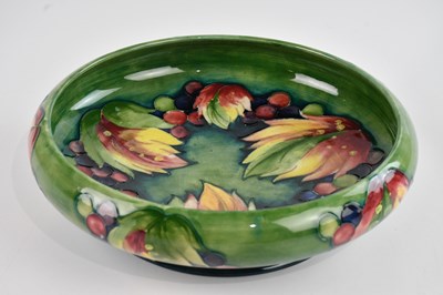 Lot 12 - WILLIAM MOORCROFT; a large footed bowl in the '...