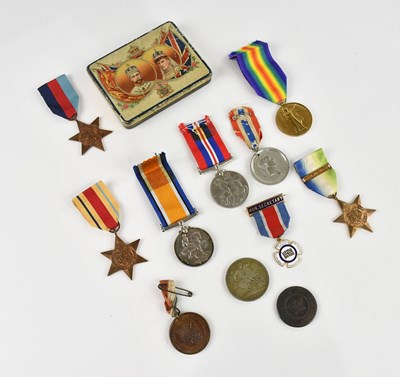 Lot 555 - Two WWI medals comprising the 1914-18 Medal...