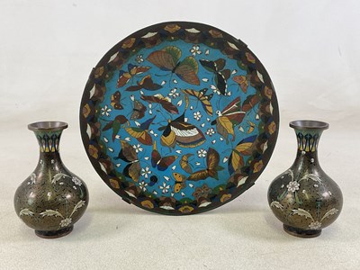 Lot 266 - A cloisonné wall plate decorated with...