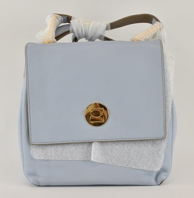 Lot 460 - COCCINELLE; a lady's pale blue leather handbag,...