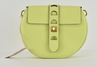 Lot 476 - COCCINELLE; a lady's lime green leather...