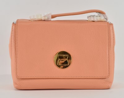 Lot 478 - COCCINELLE; a lady's salmon pink leather...