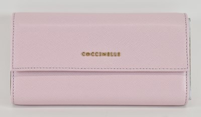 Lot 480 - COCCINELLE; a boxed lady's pink leather...