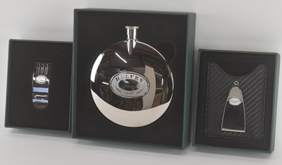 Lot 472 - DALVEY; a boxed stainless steel hip flask,...