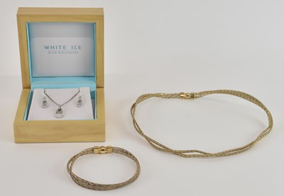 Lot 1511 - WHITE ICE; a cased 925 silver and diamond set...