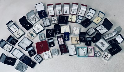 Lot 385 - A large collection of fifty-one cross pendants...