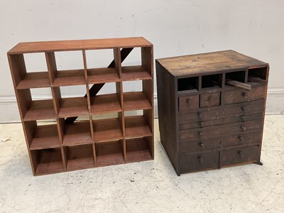 Lot 1146 - A rustic stained pine collectors' chest, with...