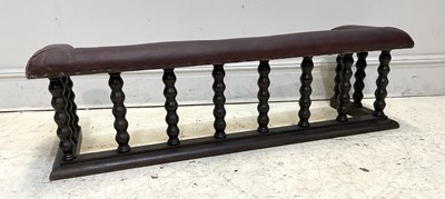 Lot 1098 - A 1920s oak club fender, with leather inset...