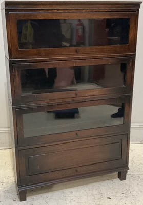 Lot 1131 - A Globe Wernicke style oak four section...