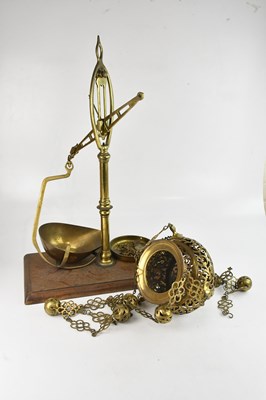 Lot 1354 - A pierced and engraved brass hanging...