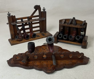 Lot 35 - A collection of pipes and pipe stands, to...
