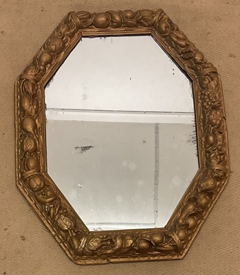 Lot 524 - A 19th century octagonal gilt wood wall mirror...