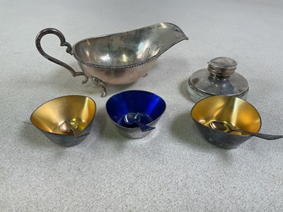 Lot 354 - An Indian white metal sauceboat, stamped...