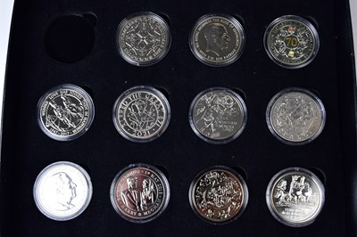 Lot 635 - Eleven silver £5 commemorative coins,...