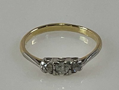 Lot 382 - A yellow metal and white metal tipped diamond...