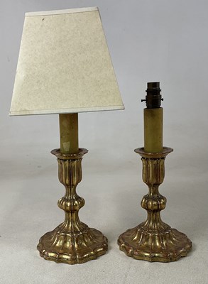 Lot 433 - A pair of gilt over wood decorative table...
