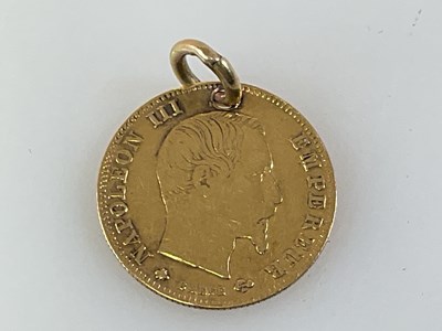 Lot 417 - A French 1860 five francs gold coin, drilled...