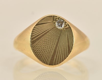 Lot 1220 - A 9ct yellow gold signet ring, the oval table...