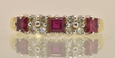 Lot 1236 - An 18ct yellow gold ring, with central cushion...