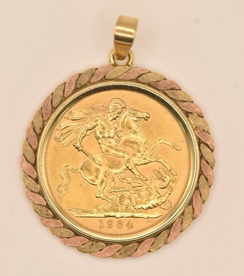 Lot 1340 - An Elizabeth II full sovereign, 1964, in 9ct...