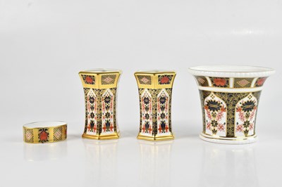 Lot 245 - ROYAL CROWN DERBY; a pair of hexagonal vases...