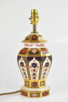 Lot 246 - ROYAL CROWN DERBY; a table lamp decorated in...