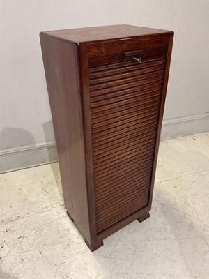 Lot 1163 - A 1920s oak filing cabinet, height 115cm,...
