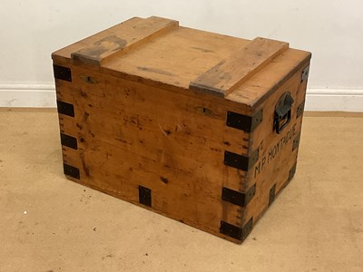 Lot 521 - A pine trunk with metal bands and handles,...