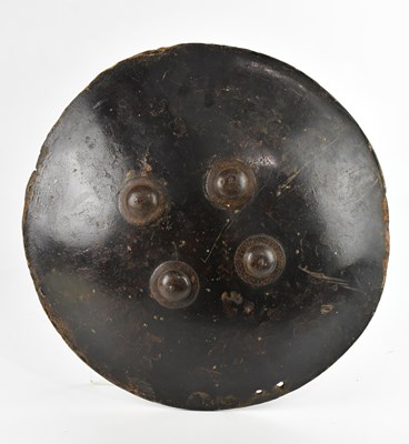 Lot 575 - An Indian dhal shield, diameter 47cm.