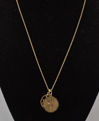Lot 1374 - A single dainty 9ct yellow gold necklace with...