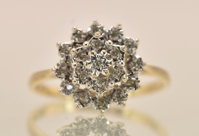 Lot 1272 - A 9ct yellow gold cone diamond cluster ring,...