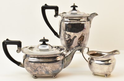 Lot 1013 - A three piece silver plated tea set comprising...