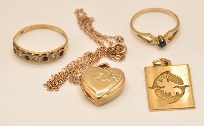 Lot 1150 - Two 9ct yellow gold dress rings, one set with...