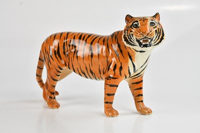 Lot 221 - BESWICK; a tiger, length approx 30cm.