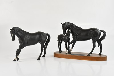 Lot 219 - BESWICK; a 'Black Beauty and Foal', on wooden...