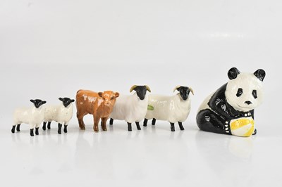 Lot 208 - BESWICK; a group of four sheep, with a panda...