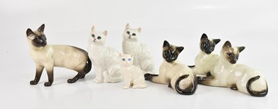 Lot 193 - BESWICK; a group of seven cats, comprising...