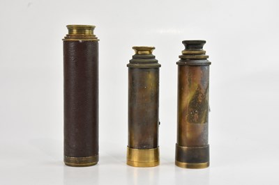 Lot 1294 - A group of three three-draw telescopes,...