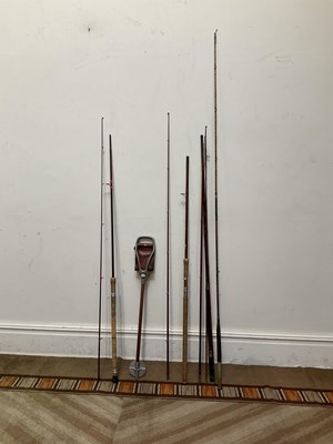 Lot 431 - Three cased and one uncased fishing rods, with...