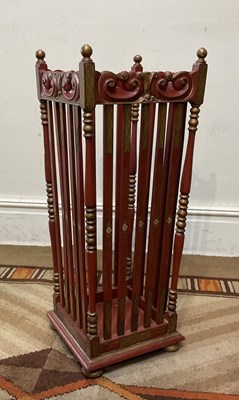 Lot 1205 - A reproduction red and gilt painted umbrella...