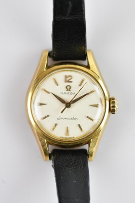 Lot 1053 - OMEGA; a lady's 18ct gold cased wristwatch,...