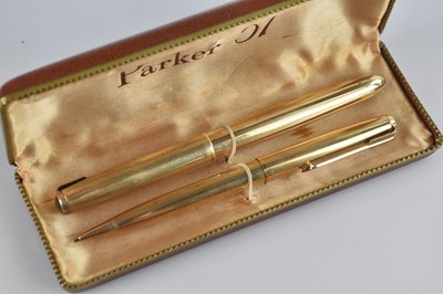 Lot 1253 - PARKER; a 1/10 12ct rolled gold pen set...