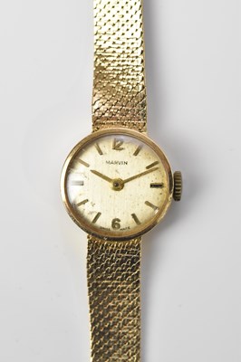 Lot 1036 - MARVIN; a lady's 9ct gold cased wristwatch,...