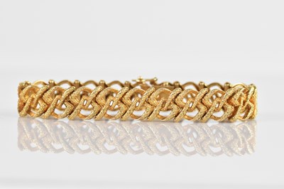 Lot 75 - A 9ct yellow gold textured fancy link bracelet,...