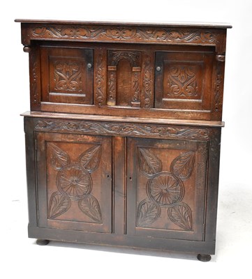 Lot 55 - A 17th century style oak court cupboard with a...