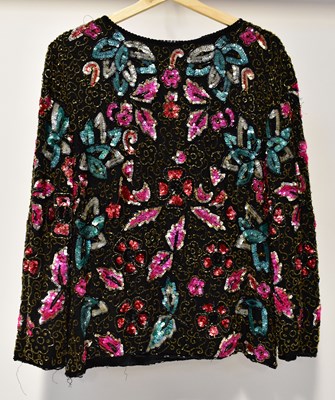 Lot 370 - A 1980s black full-length chiffon dress, the...