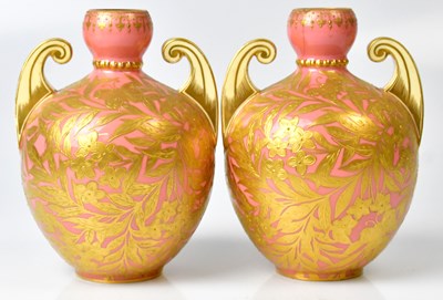 Lot 143 - ROYAL CROWN DERBY: a pair of twin-handled...