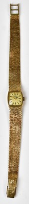 Lot 896 - TISSOT; a 9ct yellow gold bark-effect cocktail...