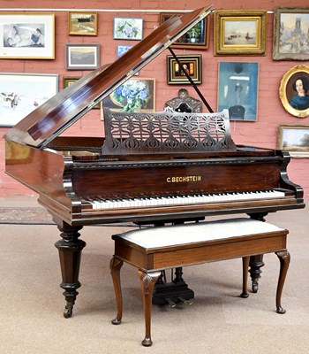 Lot 633 - BECHSTEIN; a faux rosewood grand piano model 5,...