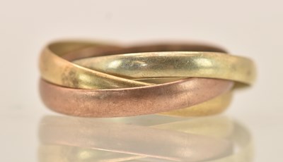 Lot 1273 - A 9ct Russian style three interlocked wedding...